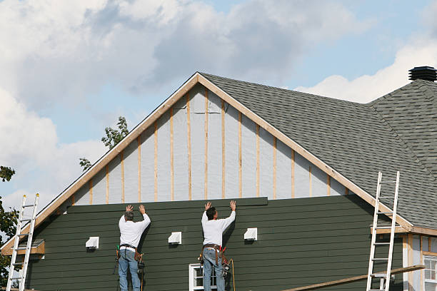 Professional Siding technician working in Titusville, FL